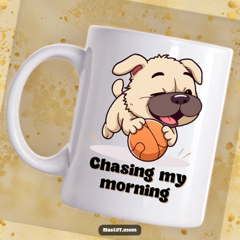 Funny Mastiff dog playfully chasing a rolling ball with excitement, depicted on a ceramic mug.
