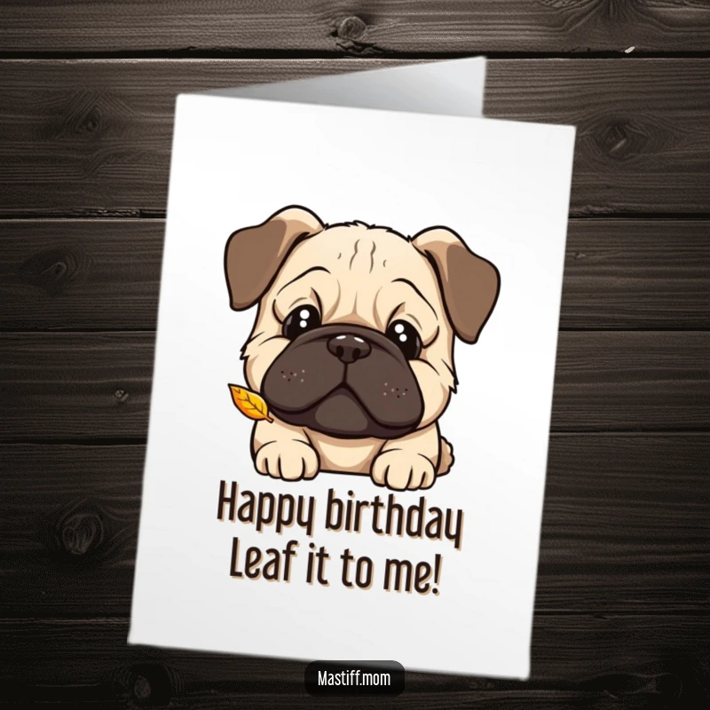Funny free printable birthday card: A kawaii Mastiff tilts its head curiously, intently watching a single leaf fall.