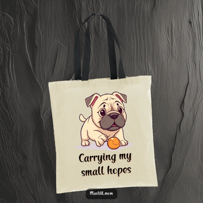 Funny Kawaii Mastiff Tote Bag, humorously failing at fetch with a minuscule ball, perfect for carrying essentials. A funny and practical tote.